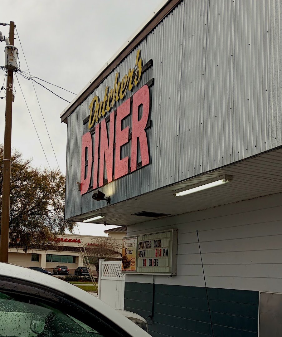 Retro diner booths and chrome trim inside.