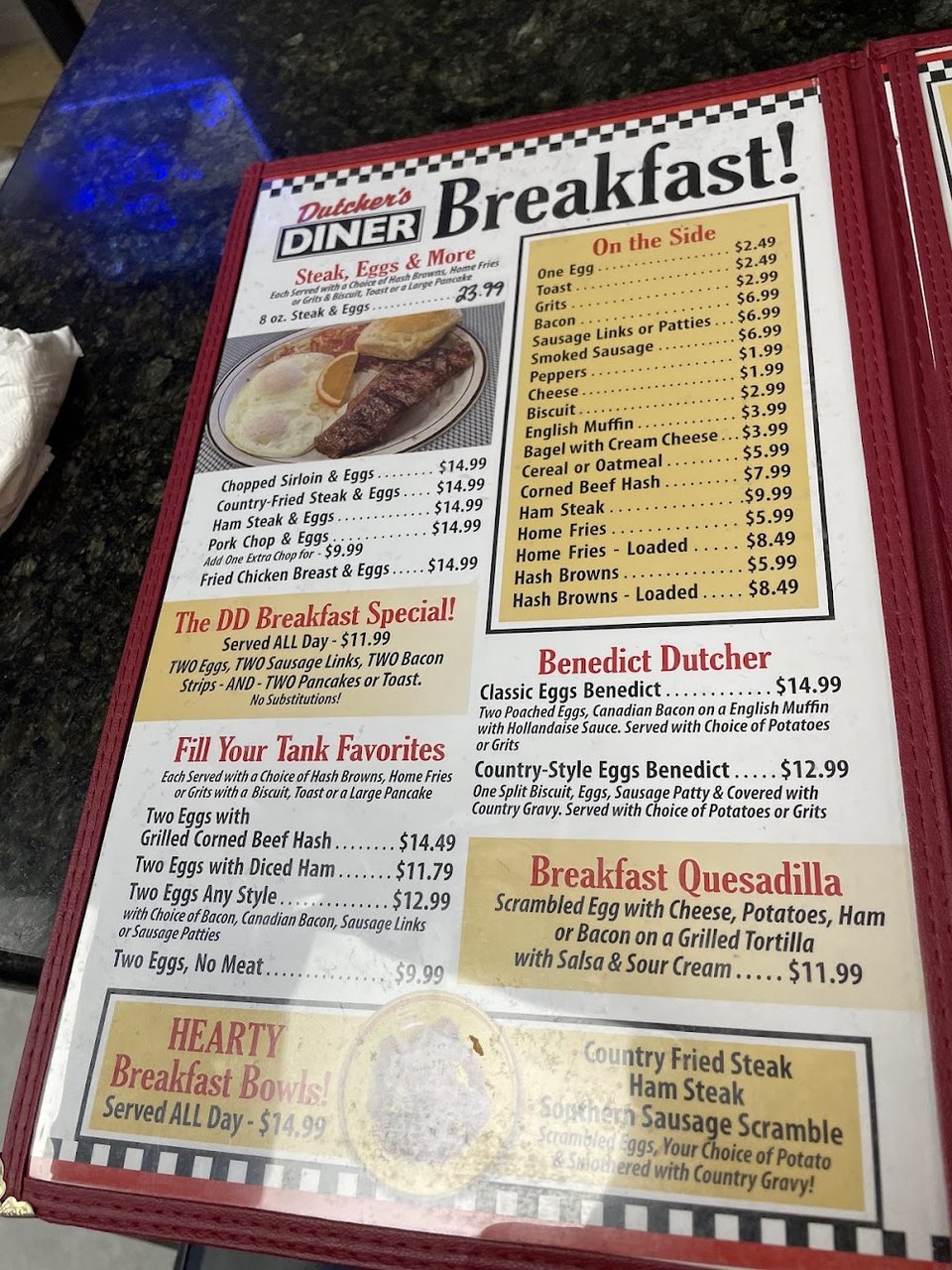 Breakfast menu with flapjacks and omelettes.